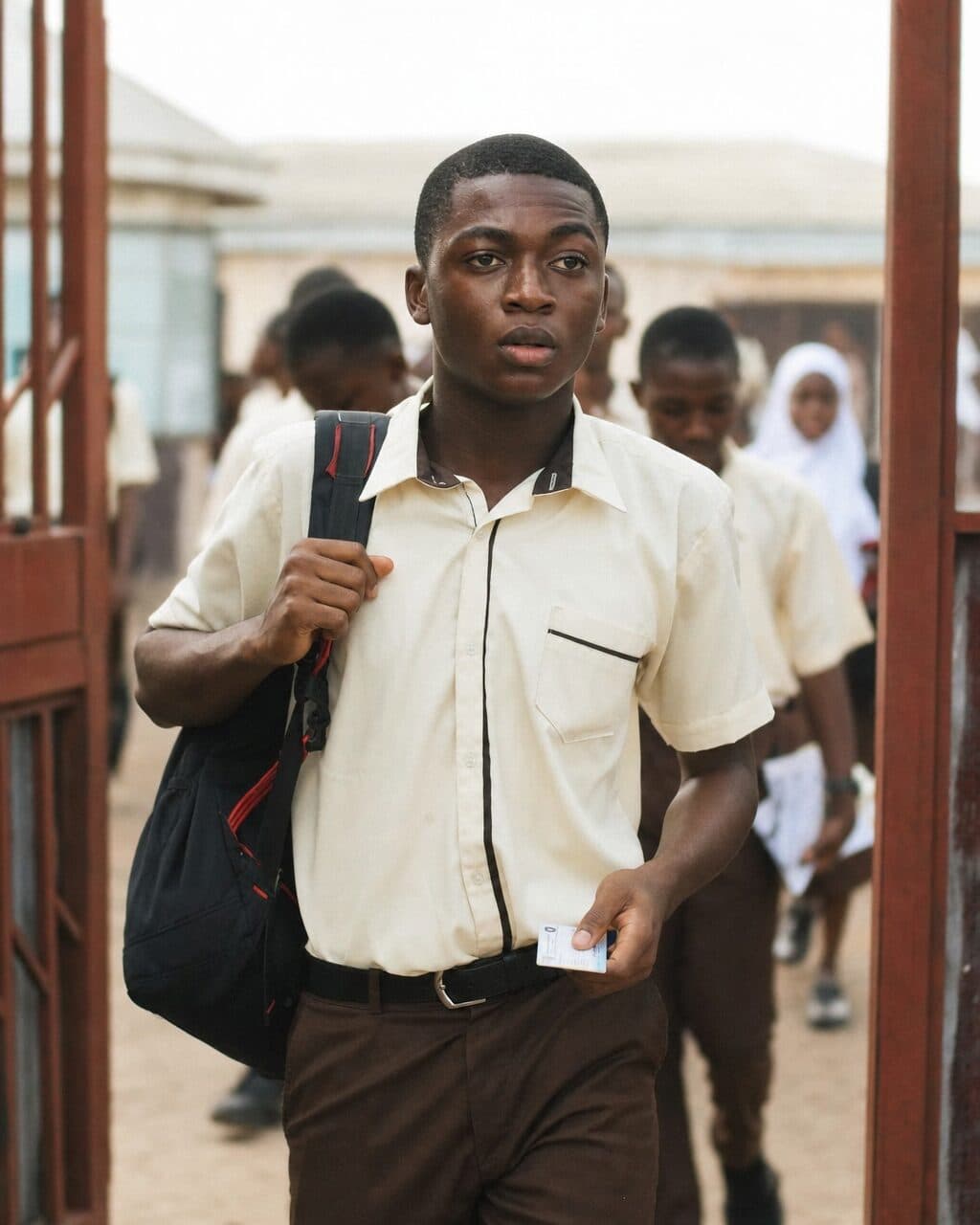A Nigerian student walking into a CBT examination centre